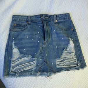 Denim mini skirt with pearl details